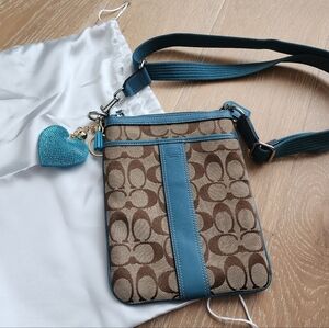 EUC Coach Signature Canvas Leather Swingpack Crossbody Bag in tan and blue/teal